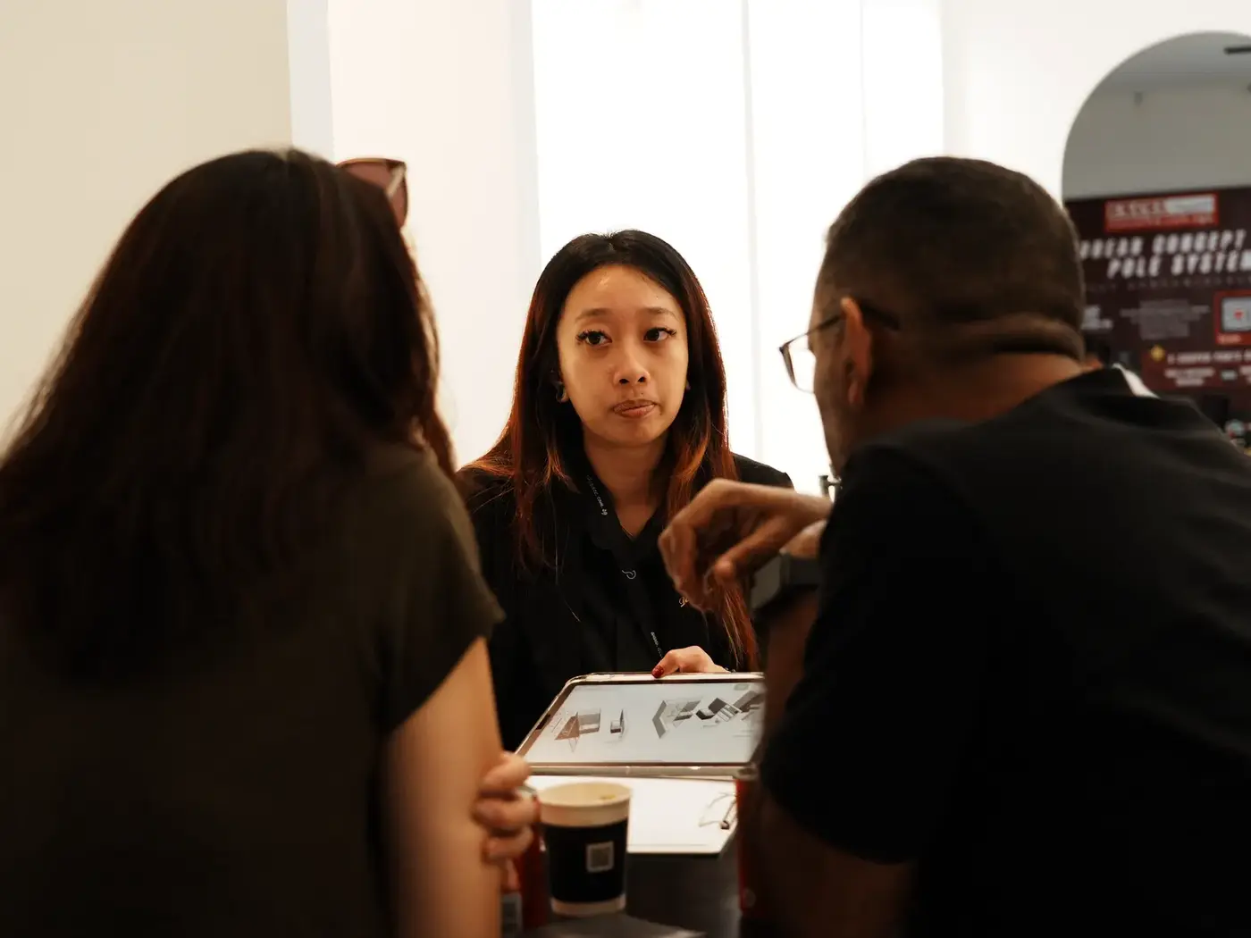Guests reviewing renovation brochures together