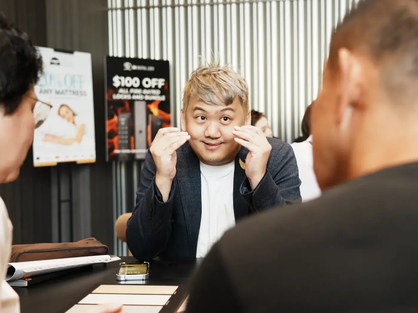Homeowners laughing during a design consultation